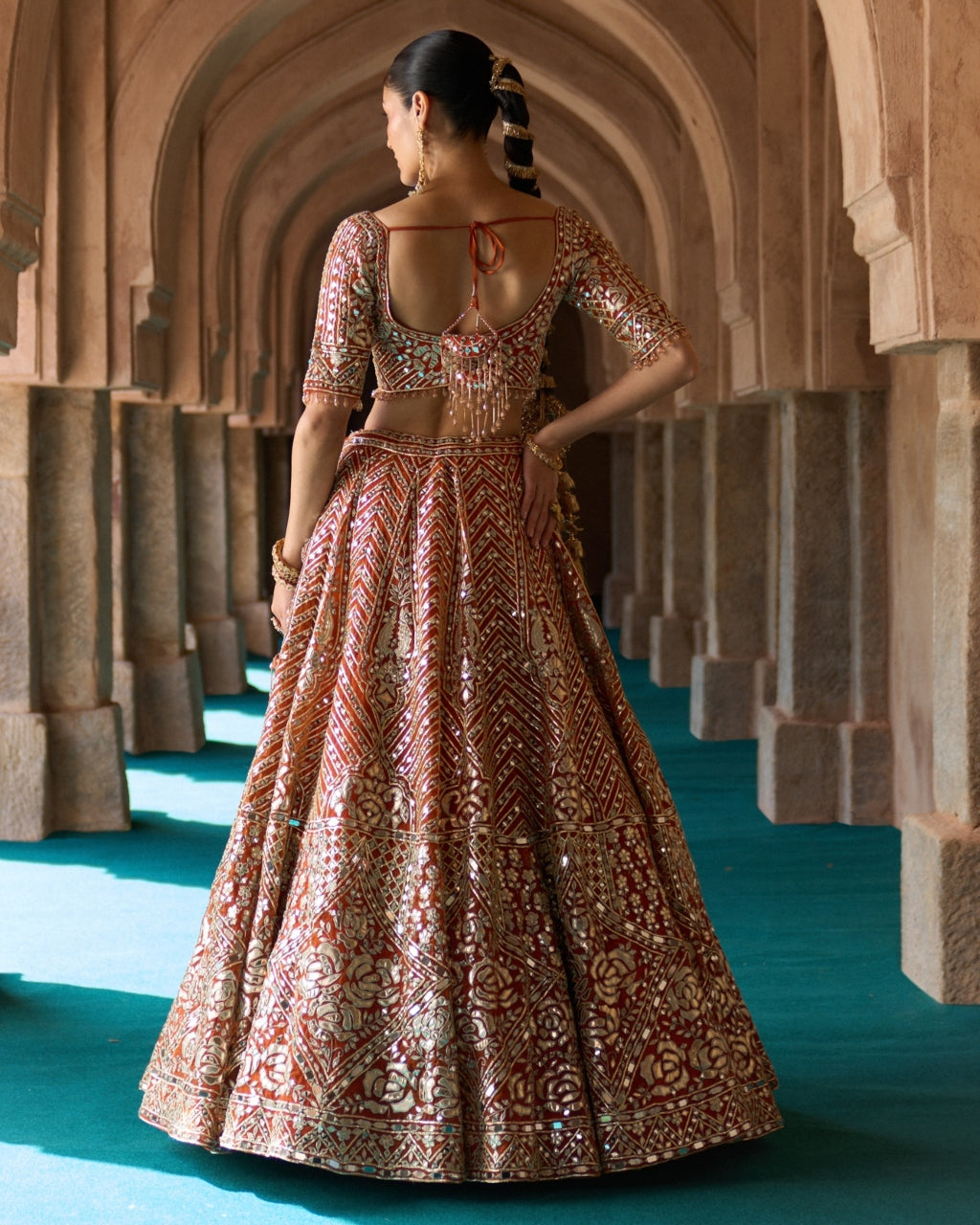 Teja Lehenga in Rust Orange